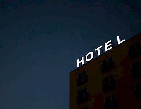 A building with a partially lit 